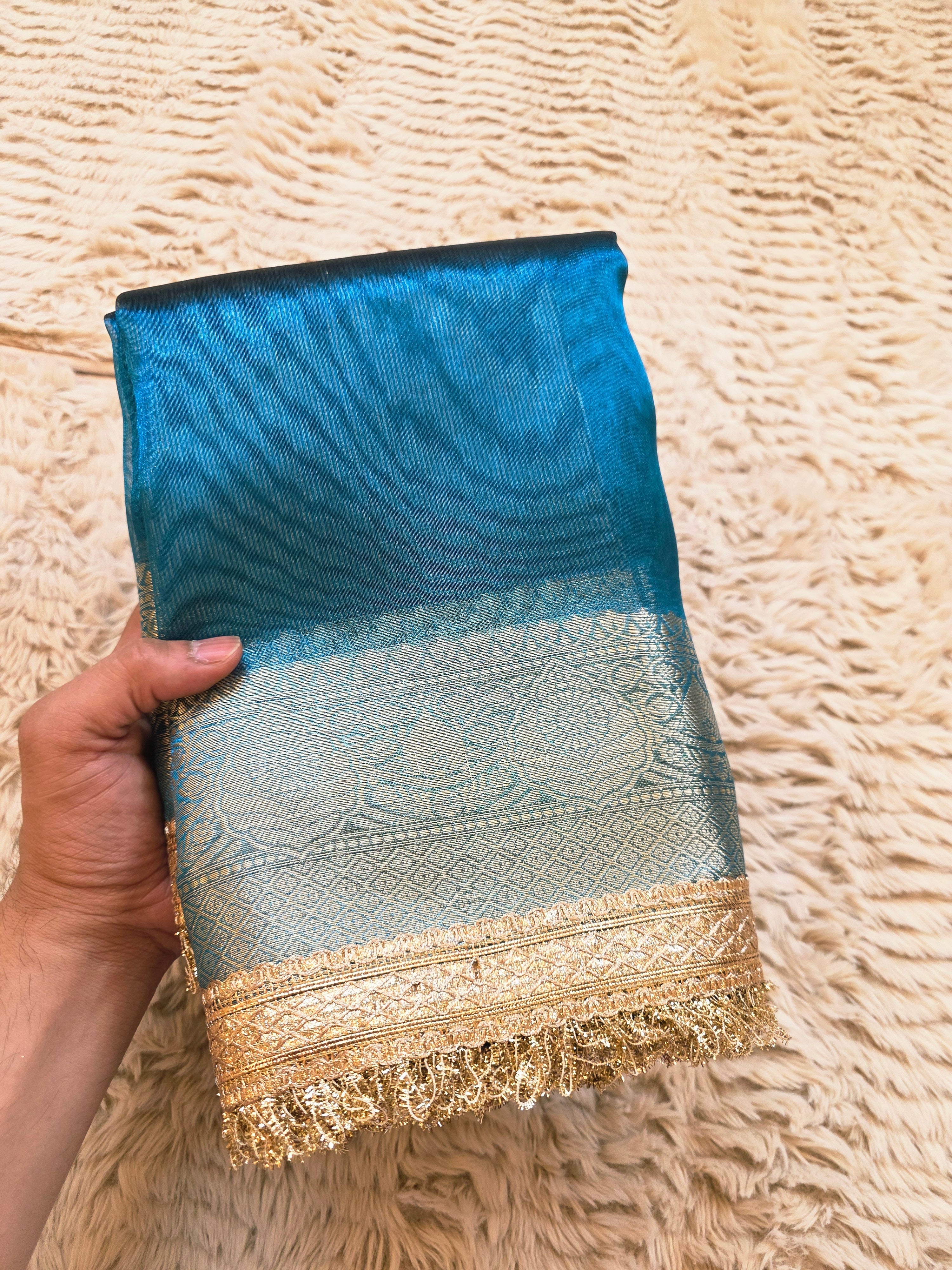 Royal Banarasi Tissue Saree having Plain Body & Lace Border
