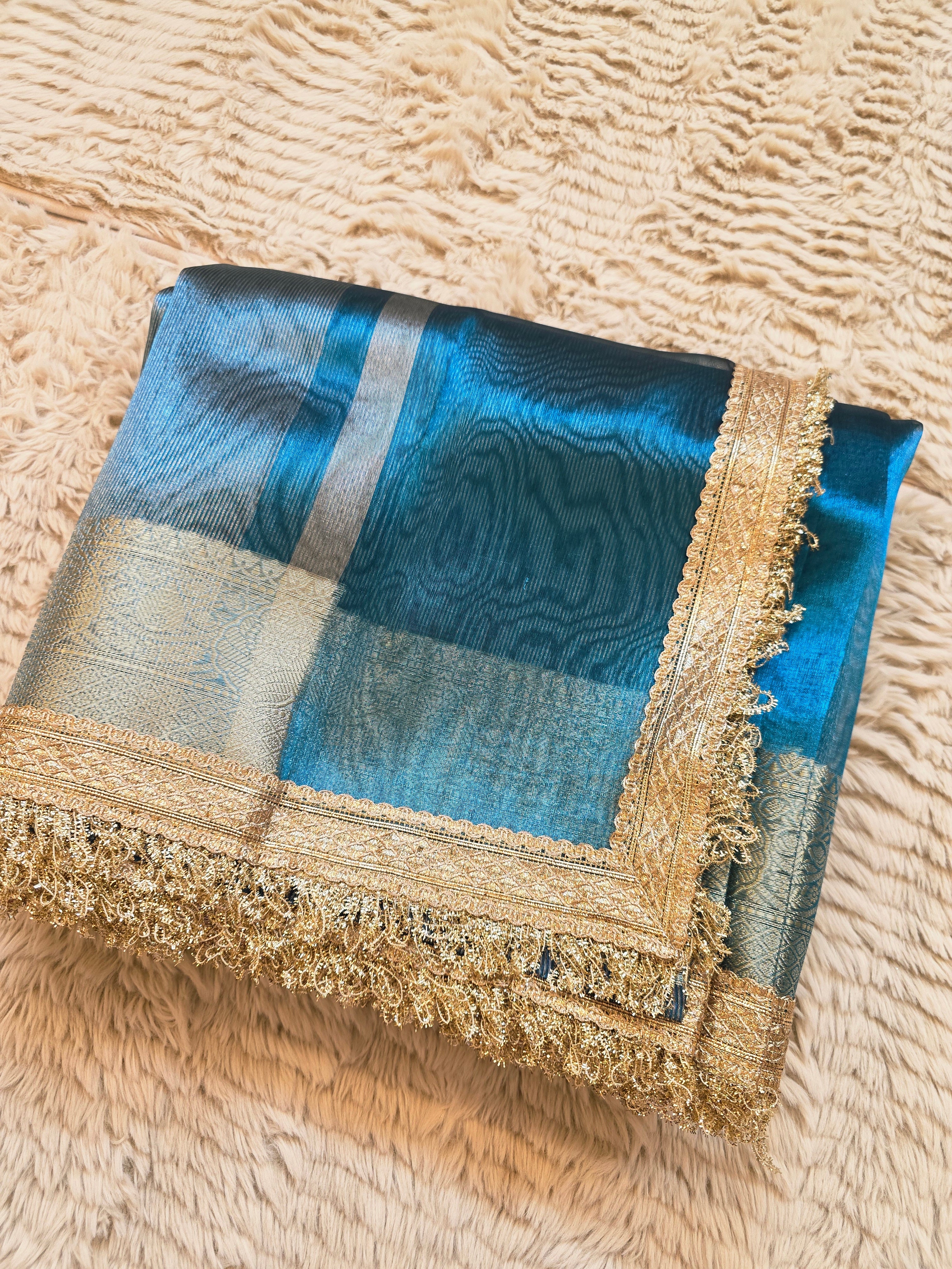 Royal Banarasi Tissue Saree having Plain Body & Lace Border